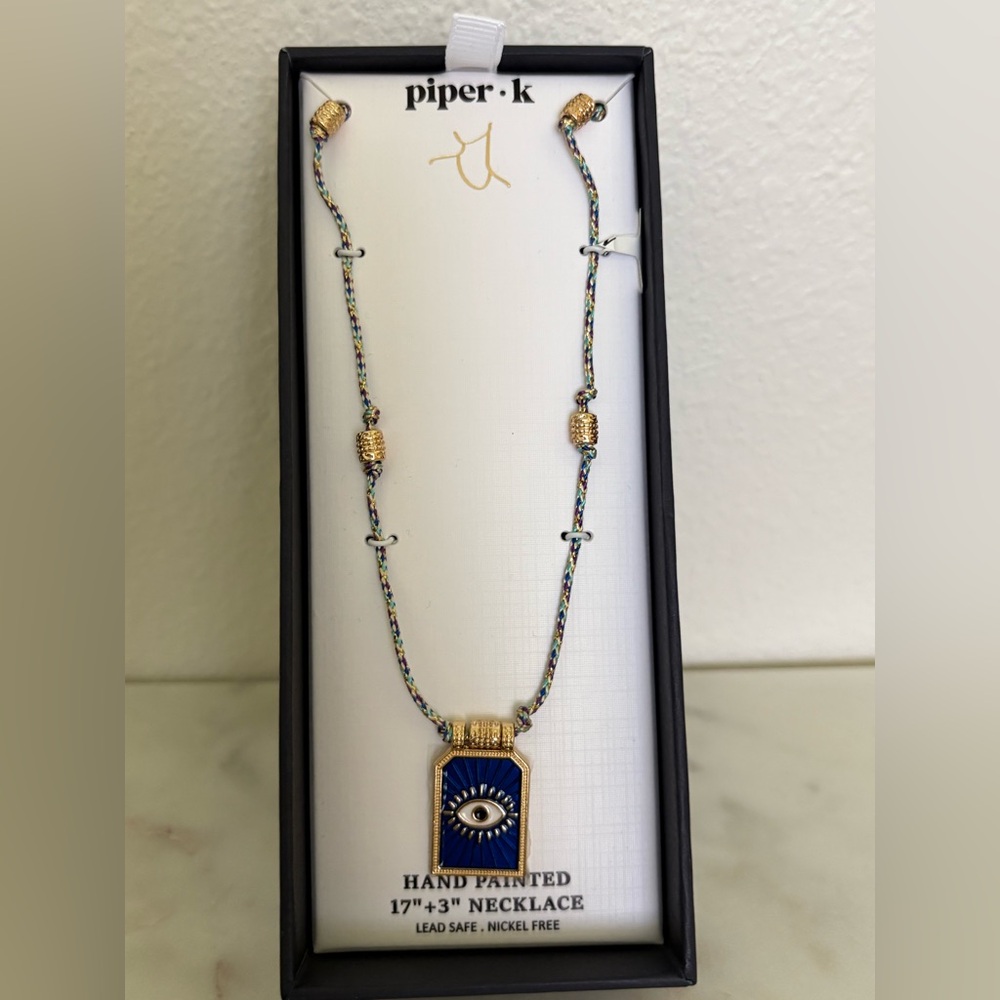 Elegant Gold and Blue Necklace with Pendant